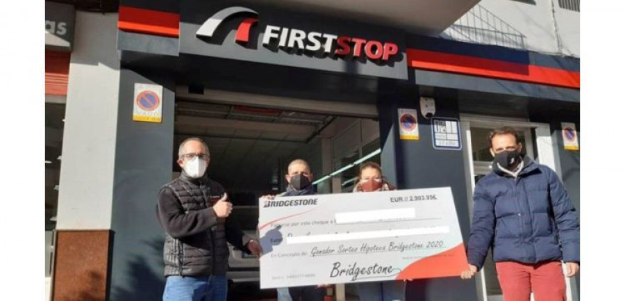 Entrega cheques hipoteca bridgestone first stop