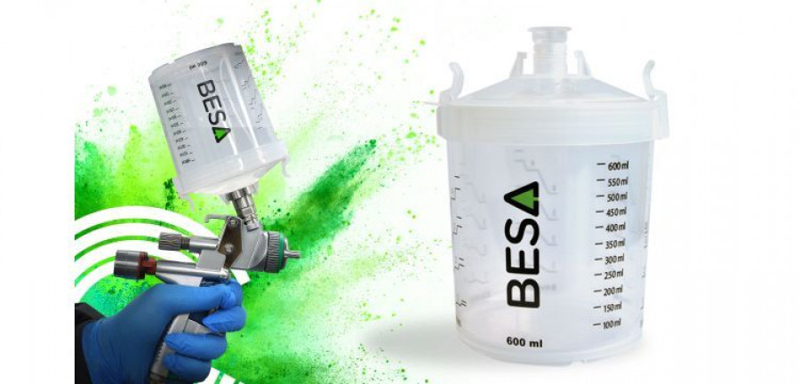 Explosion of coloured powder on white background