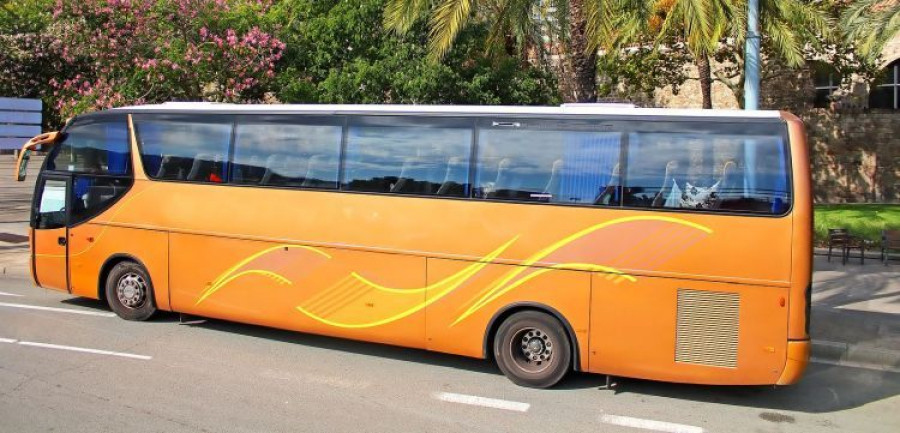 Orange tourist bus in Barcelona, Catalonia, Spain