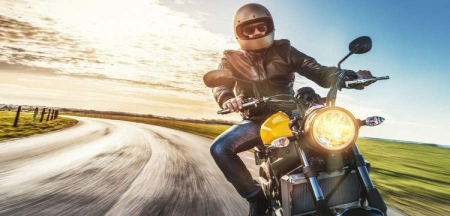 Motorbike On The Road Riding. Having Fun Riding The Empty Road O