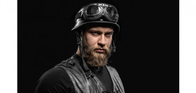 Portrait Handsome Bearded Biker Man in Leather Jacket and Helmet