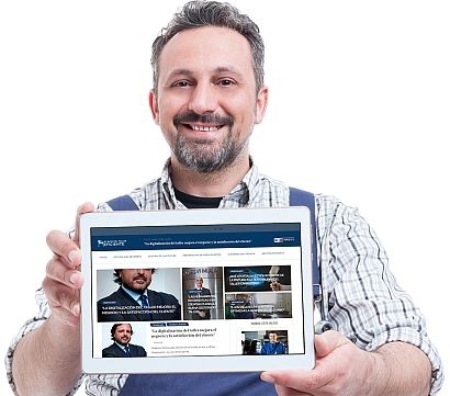 Portrait of joyful repairman holding digital tablet with blank display isolated on white with copy space area